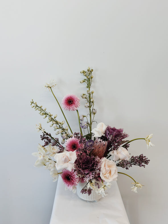 Pink and purple flowers in a pot